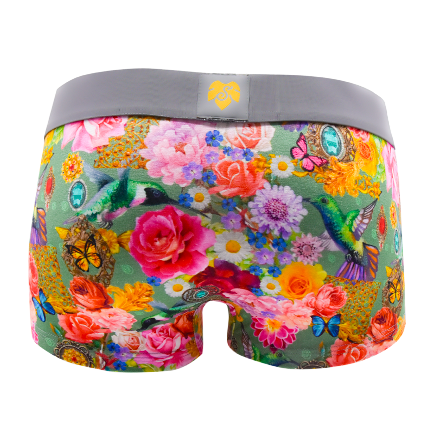 Schockhöschen Panty Kolibri Rückansicht — Kolibris, Rosen und Schmetterlinge auf olivgrünem Grund, grauer Bund, goldenes Logo, maximalistischer Blumenprint