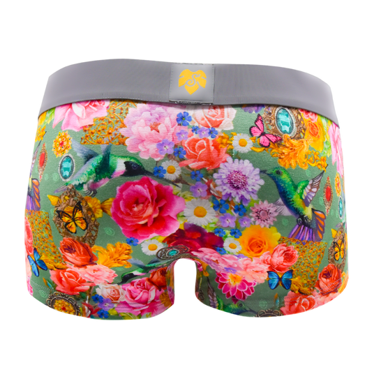 Schockhöschen Panty Kolibri Rückansicht — Kolibris, Rosen und Schmetterlinge auf olivgrünem Grund, grauer Bund, goldenes Logo, maximalistischer Blumenprint
