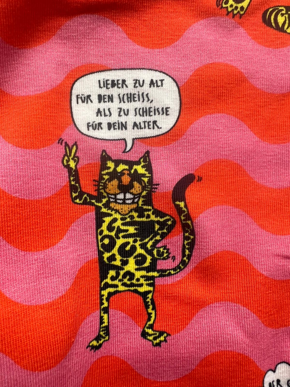 Schockhöschen Panty Tiger mit Weisheiten Detailansicht — Tiger-Illustration mit Weisheiten-Sprechblasen, leuchtend orange-pinkes Wellenmuster, 95 % Baumwolle fair genäht